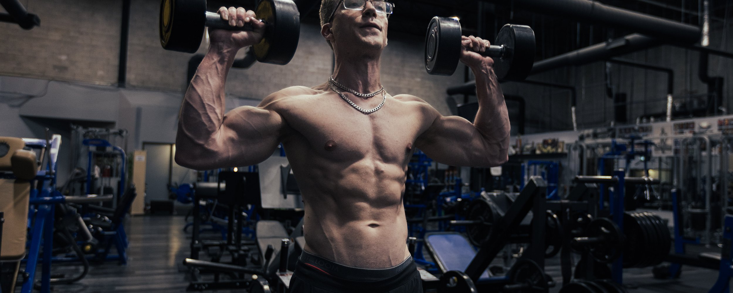 Matt Kennedy lifting
    dumbbells at Fitness Element Markham
