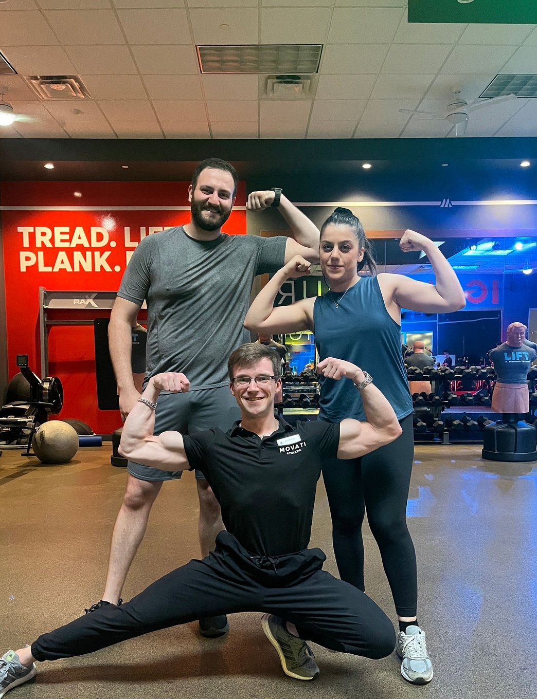 Matt Kennedy posing with personal
training clients